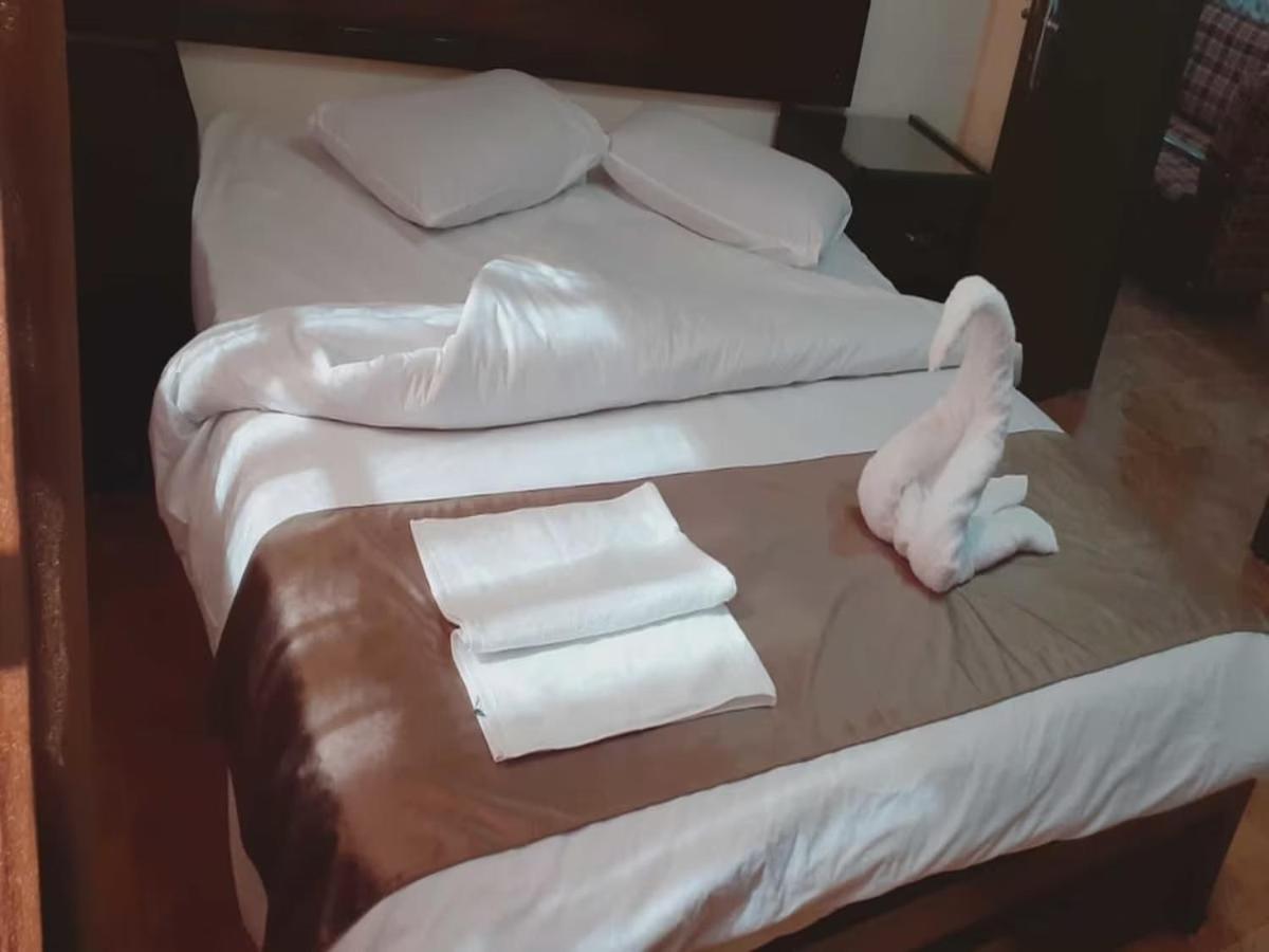 Al-Nujoom Hotel Suites Амман Екстер'єр фото